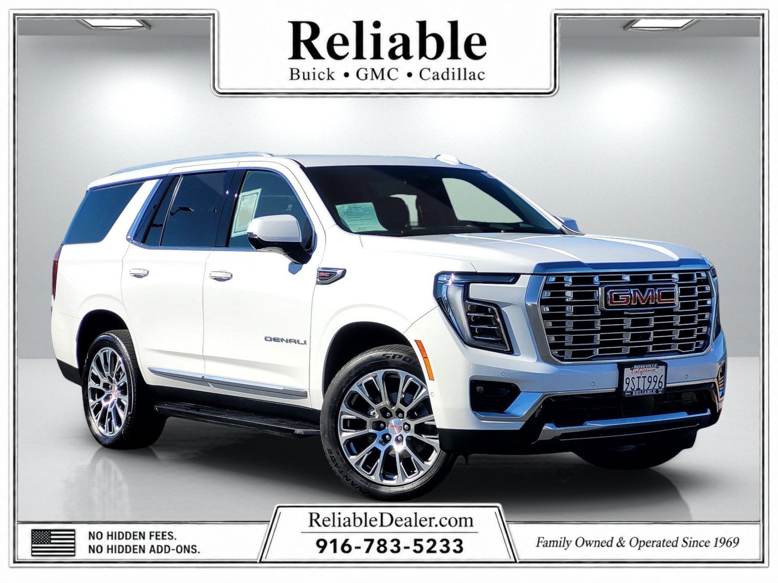 2025 GMC Yukon Denali in Summit White — front three-quarter view
