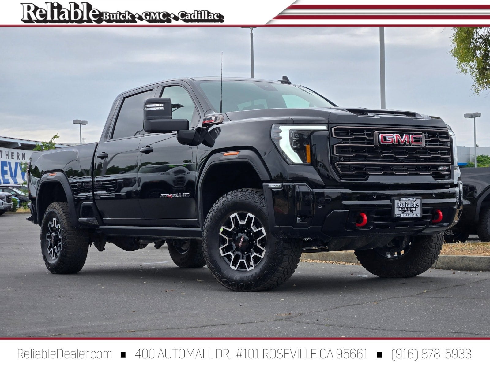 2026 GMC Sierra 2500 HD AT4X in Onyx Black — front three-quarter view