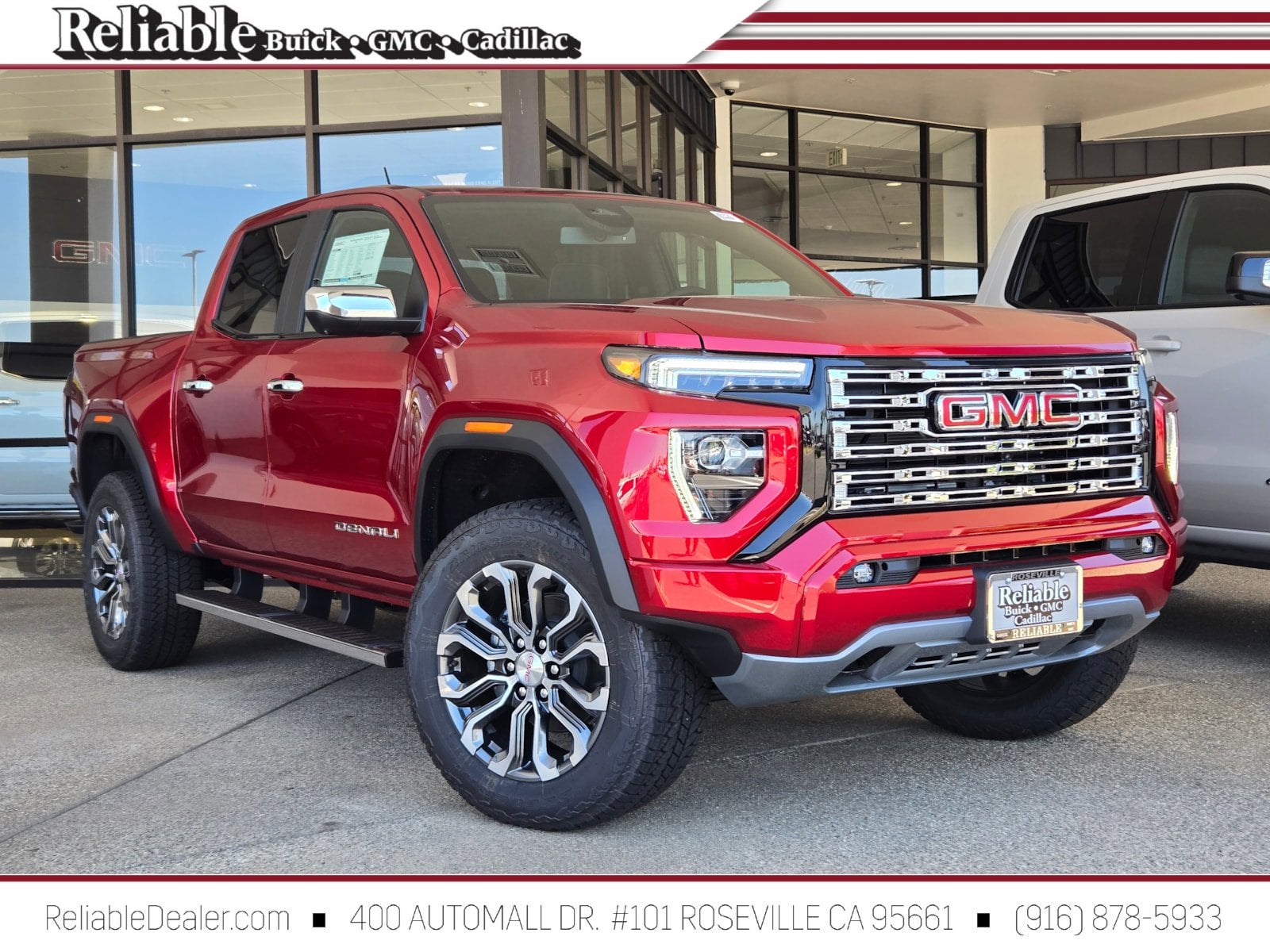 2026 GMC Canyon Denali in Volcanic Red Tintcoat — front three-quarter view